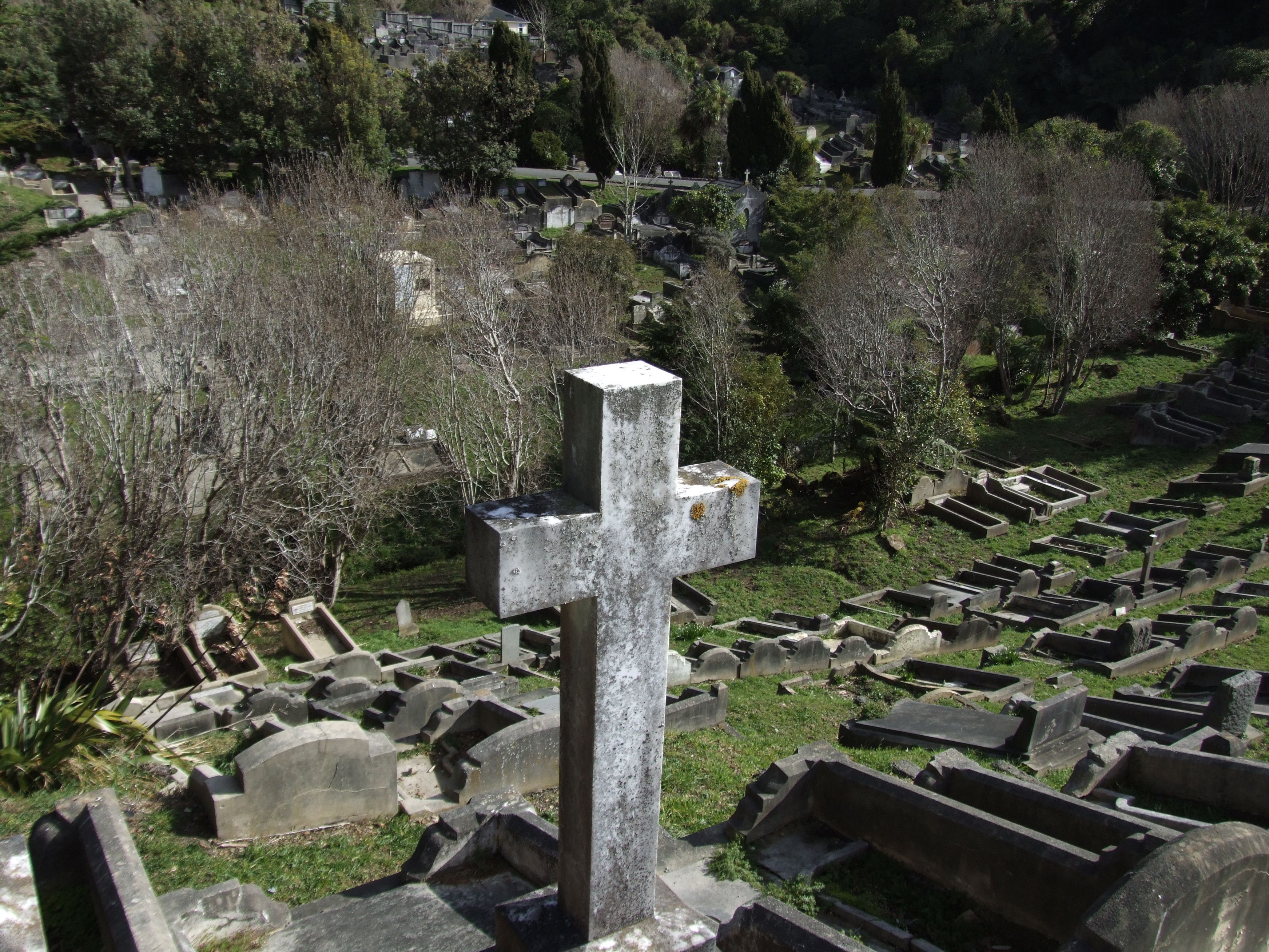 Karoru Cemetery in Wellington, New Zealand (1 of 2) (26732 KB) 'Cross with graves karori cemetery' by Andrew McMillan - http://www.public-domain-image.com/public-domain-images-pictures-free-stock-photos/miscellaneous-public-domain-images-pictures/cross-with-graves-karori-cemetery.jpg. Licensed under Public Domain via Wikimedia Commons (file source: http://commons.wikimedia.org/wiki/File:Cross_with_graves_karori_cemetery.jpg). (Click on Picture to View Full Size) picture