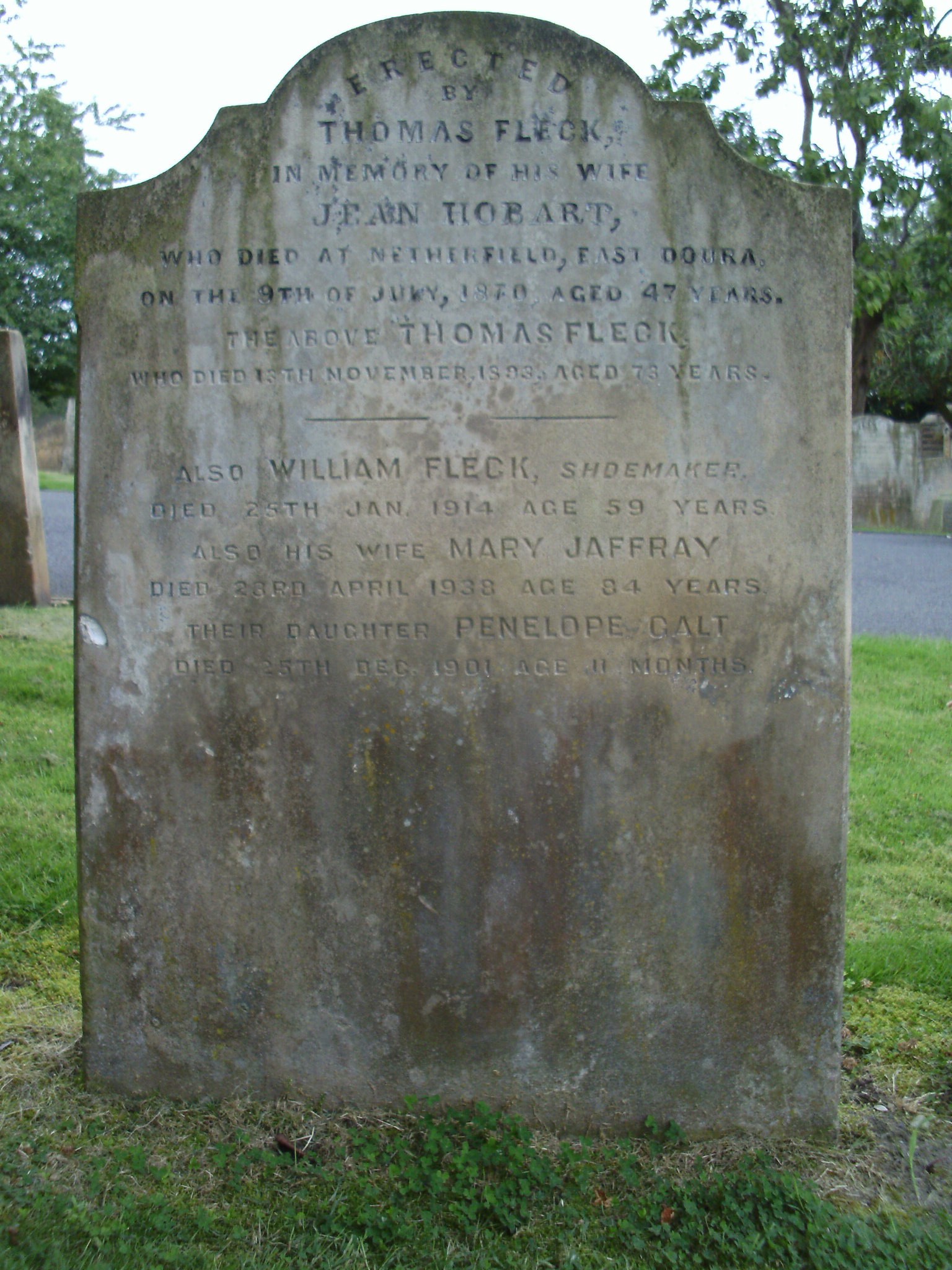 Fleck family monument in Irvine Old Parish Churchyard (gravestone A21). (9216 KB) 29 July 2014 Fleck family monument for Thomas Fleck, his wife Jean Hobart, his nephew William Fleck, his nephew's wife, Mary Jaffrey, and his great-niece, Penelope Galt Fleck; Irvine Old Parish Churchyard, Irvine, Ayrshire, Scotland (gravestone A21). Photo originally shared by B.J. Little (bjl1946) to his family tree on Ancestry.com. '2014-07-29 14.12.17 - bjl1946 bjl1946 originally shared this 29 Jul 2014 Portrait / Family Photo Irvine Old Parish Churchyard' (Click on Picture to View Full Size) picture