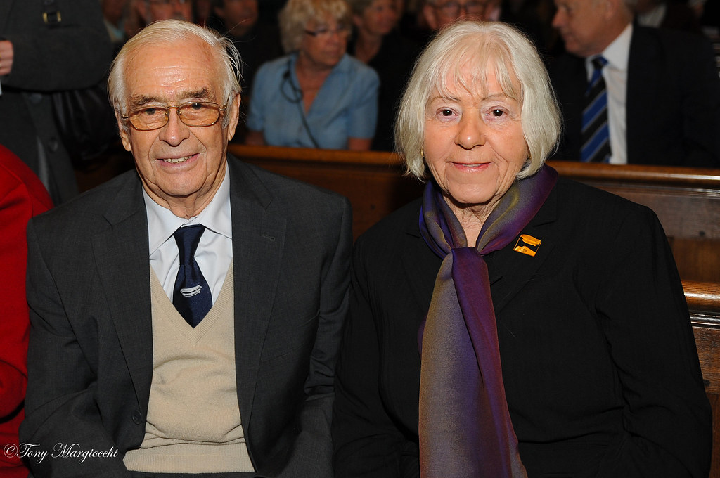Peter and Enid Holmes at St. Mary's church Cardington, during the Thanksgiving and Remembrance Service on the 80th Anniversary of the loss of the R101 (2040 KB) October 2010 'Enid Rosemary Holmes (Nee Giblett) Mrs Holmes father was Maurice A Giblett, who was the Superintendent Meteorologist for Airships, and flew with and perished on H.M. Airship R101. Mrs Holmes is pictured here with her husband Peter, at St. Mary's church Cardington, during the Thanksgiving and Remembrance Service on the 80th Anniversary of the loss of the R101.' Photo ©Tony Margiocchi (Click on Picture to View Full Size) picture