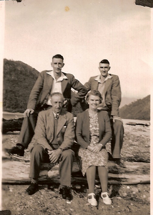 Hugh and Mary Milligan with their adult sons Bill and Jim at Mokihinui Beach (1039 KB) May 1947 margw37 originally shared this on 27 Aug 2008 'Family Photo, looking very relaxed at the beach.' (Click on Picture to View Full Size) picture