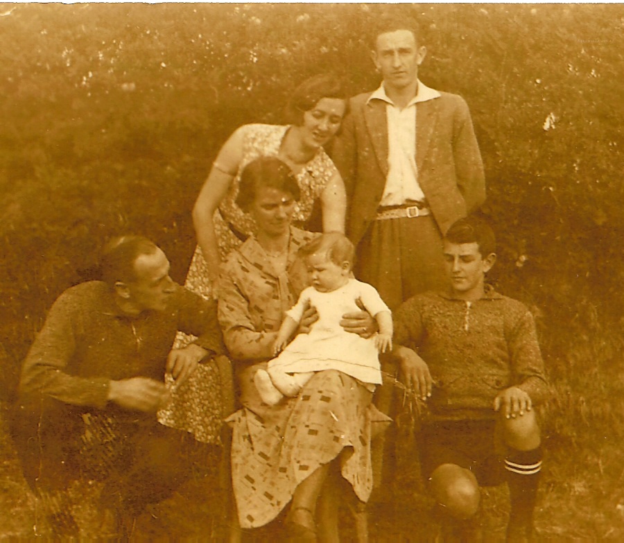 The Hugh Milligan family with the first grandchild (2064 KB) 1935 Standing, Ivy and Bill Milligan; crouching and seated, left to right, Hugh Milligan, wife Mary, son Jim Milligan; first grandchild Mary on lap. Photo courtesy of Marg W. (Click on Picture to View Full Size) picture